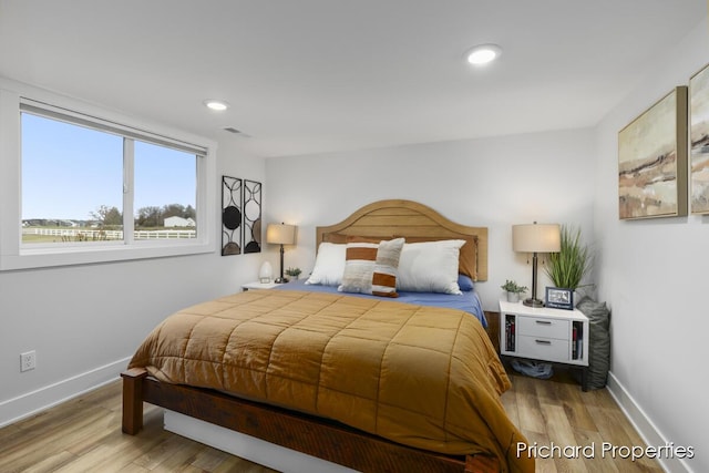 bedroom featuring light wood-type flooring