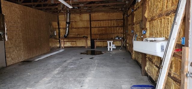 garage with wood walls