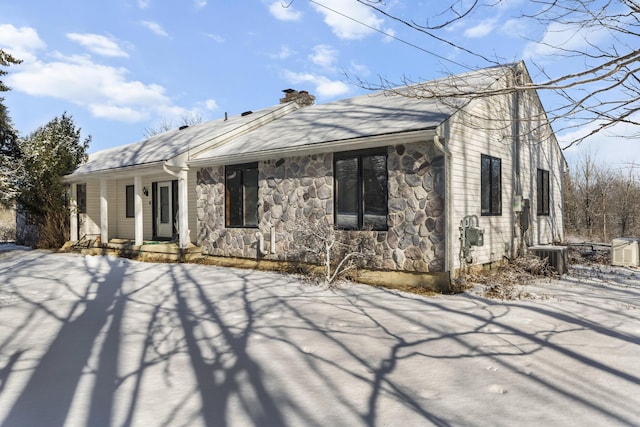 back of property with central air condition unit