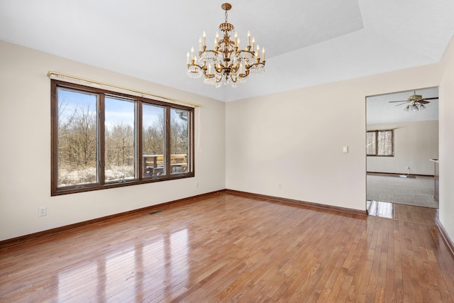 spare room featuring ceiling fan and light wood-type flooring