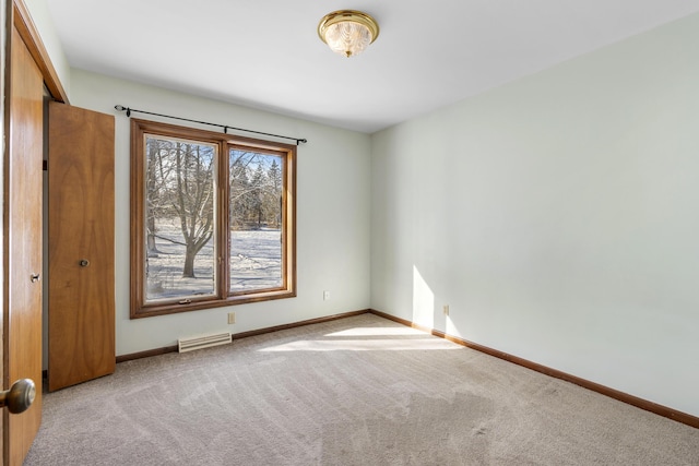 view of carpeted spare room