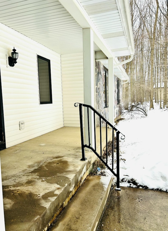 view of snow covered deck