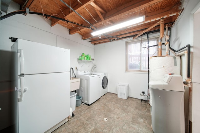 washroom featuring washer and dryer