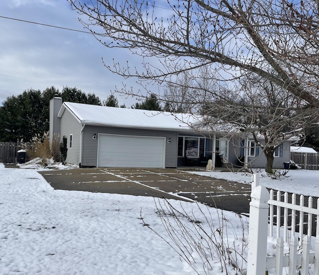 view of front of home featuring a garage