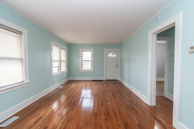 foyer featuring dark hardwood / wood-style floors