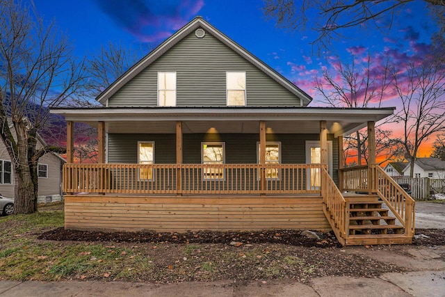 view of front of property featuring covered porch