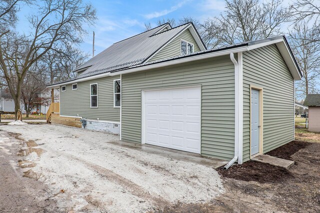 view of side of property featuring a garage