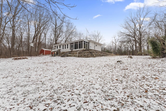 exterior space with a sunroom