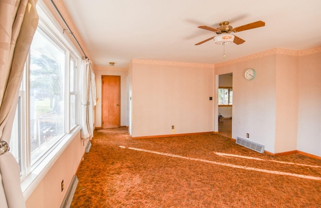 empty room featuring carpet and ceiling fan