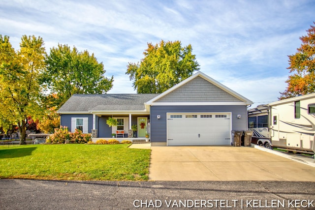 view of front of house featuring a front lawn, a porch, and a garage