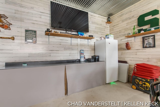 bar featuring wooden walls