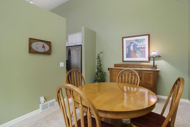 view of carpeted dining room