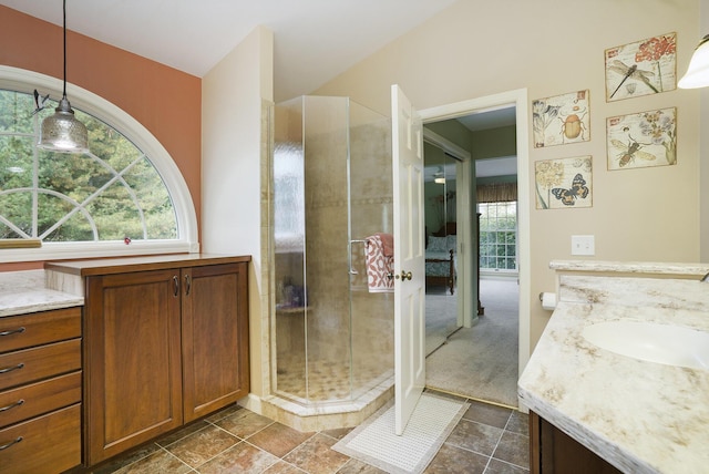 bathroom with vanity and walk in shower