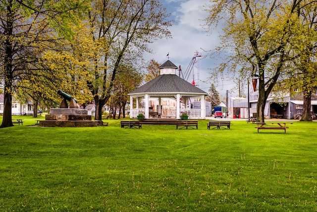 view of home's community with a gazebo and a yard