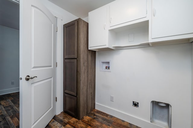 laundry area with electric dryer hookup, cabinets, dark hardwood / wood-style flooring, and washer hookup