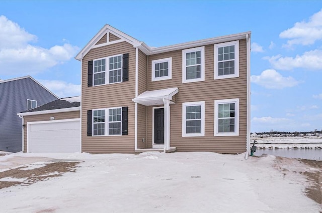 view of front of home with a garage