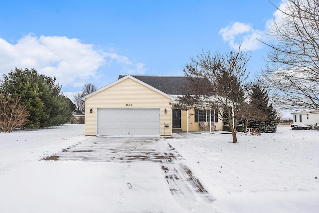 view of front of home featuring a garage