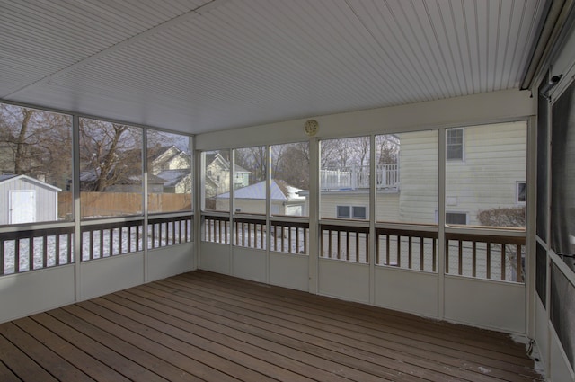 unfurnished sunroom with a healthy amount of sunlight