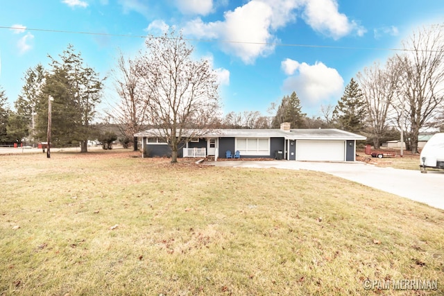 single story home featuring a front yard and a garage