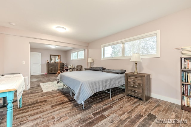 bedroom featuring dark wood-type flooring