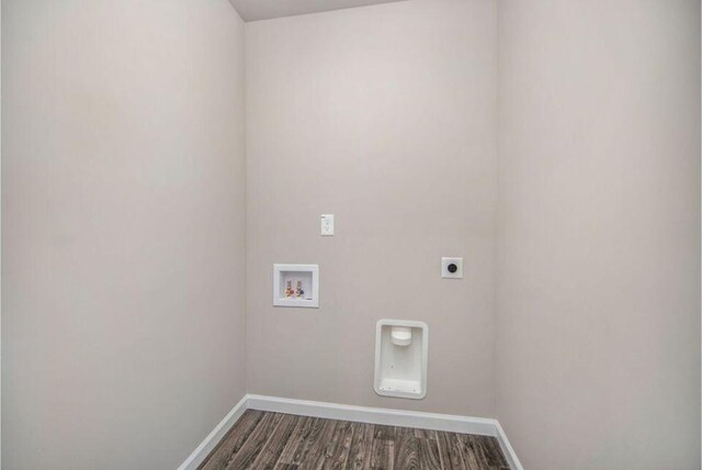 laundry room with hookup for a washing machine, hookup for an electric dryer, laundry area, dark wood-type flooring, and baseboards