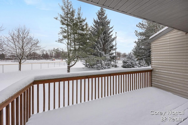 view of snow covered deck