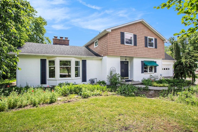 front facade with a front lawn