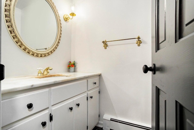 bathroom featuring vanity and a baseboard radiator