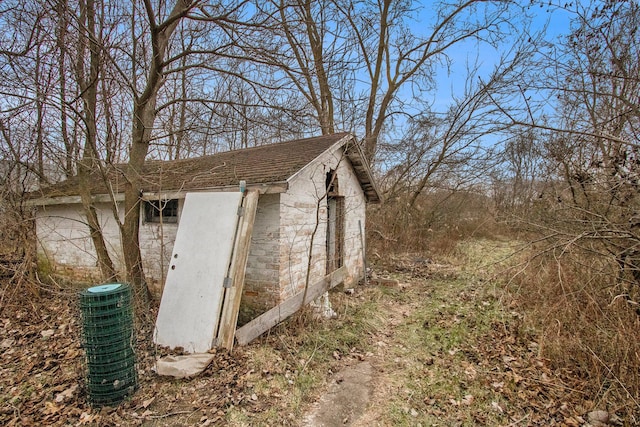 view of outdoor structure featuring central air condition unit