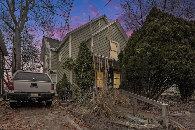 view of property exterior at dusk