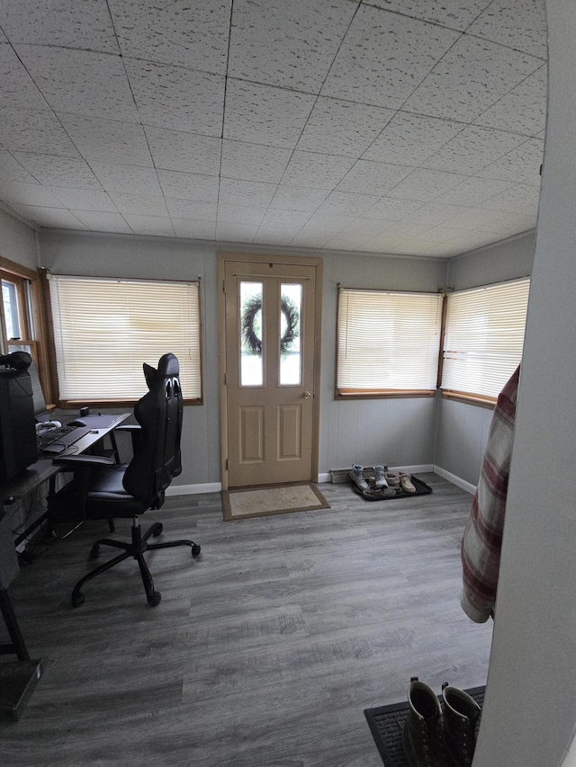 home office with hardwood / wood-style floors