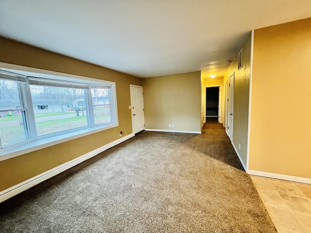 unfurnished room featuring carpet floors