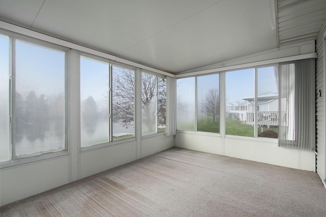 unfurnished sunroom with vaulted ceiling