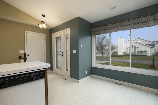 kitchen with dishwasher and lofted ceiling