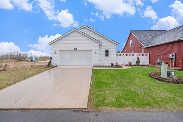 view of front of property with a front yard, central AC, and a garage