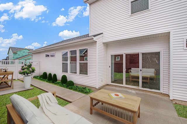 rear view of house with a patio area