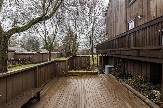 wooden terrace with a residential view and central AC
