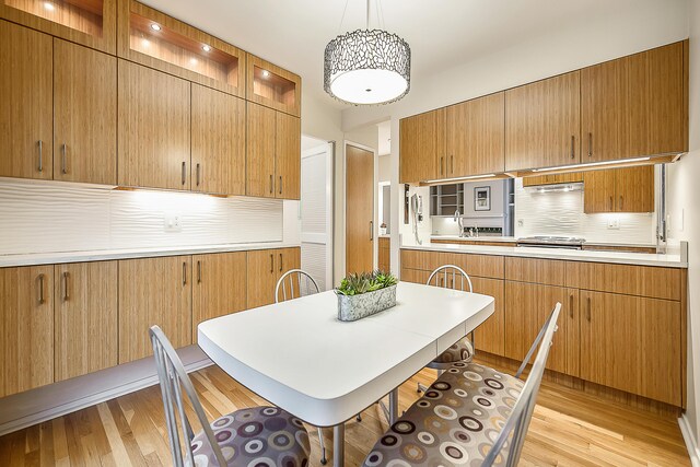 dining room featuring light wood-style floors