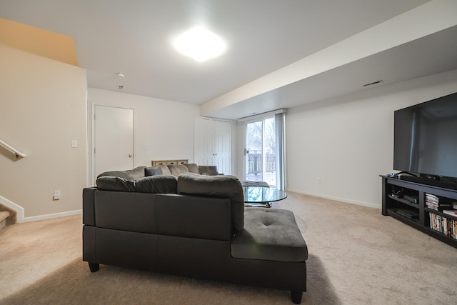 living room with light colored carpet