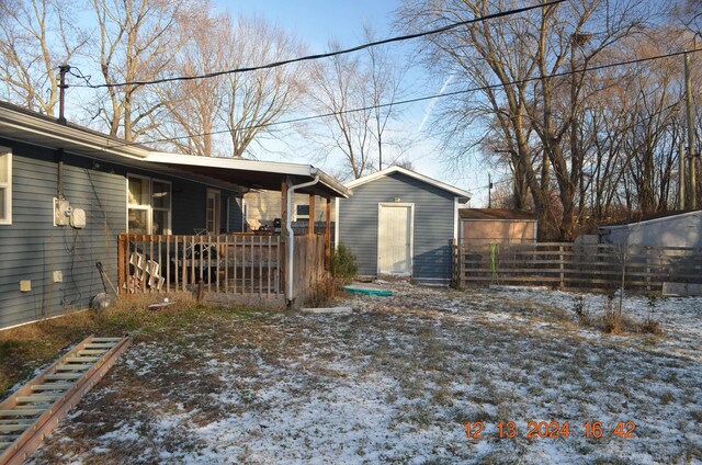 exterior space featuring a storage unit