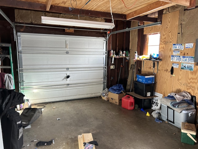 garage with wood walls