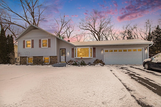 tri-level home featuring a garage