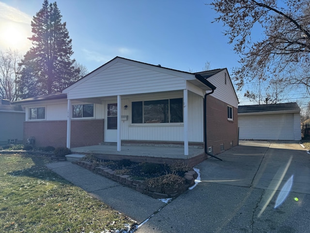 view of front of house featuring a porch and a garage