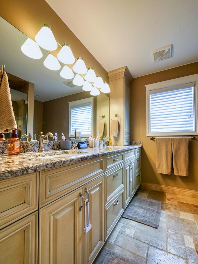 bathroom featuring vanity