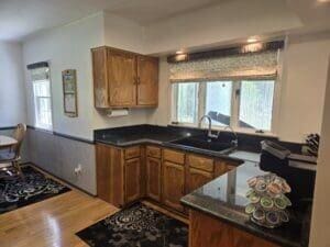 kitchen featuring hardwood / wood-style flooring and sink