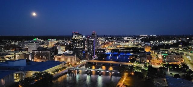 property's view of city featuring a water view