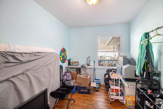 bedroom featuring hardwood / wood-style floors