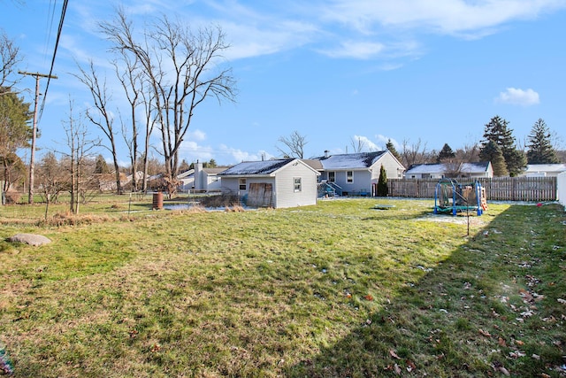 view of yard with a trampoline