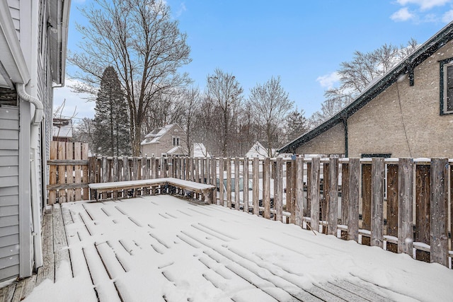 view of snow covered deck