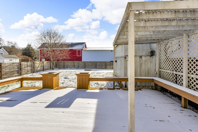 view of snow covered deck